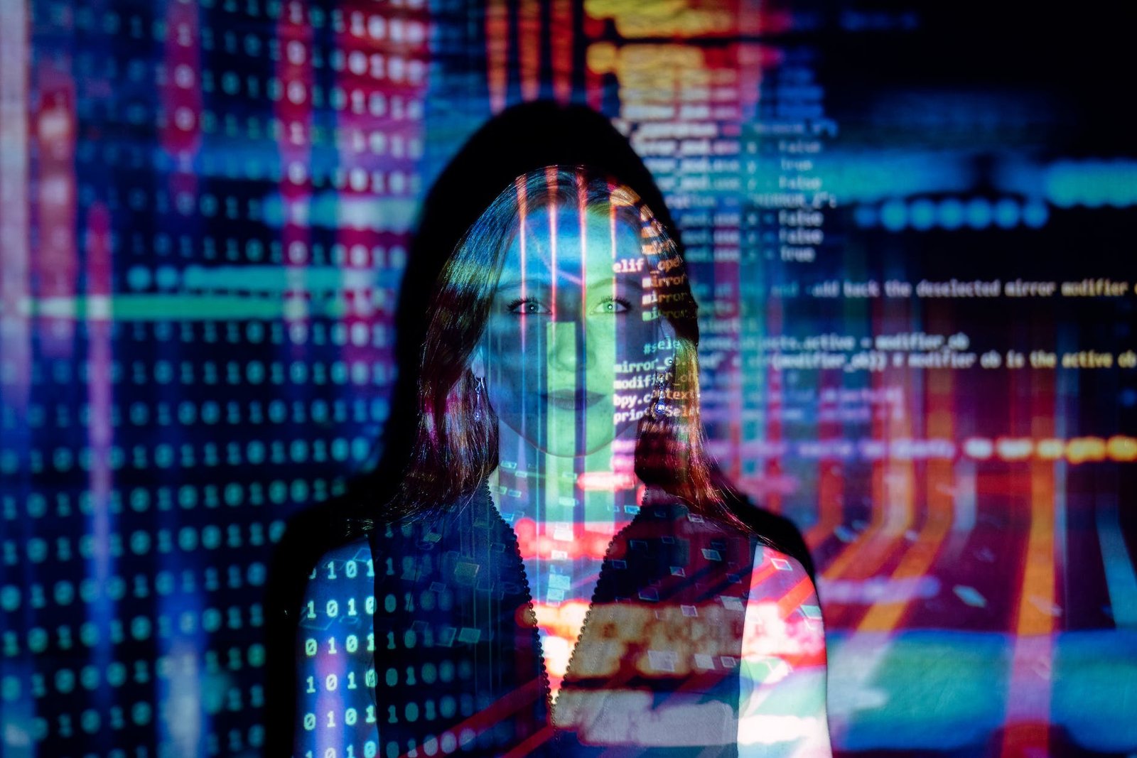 code projected over woman | AI Tools List: Top Mind-Blowing Artificial intelligence